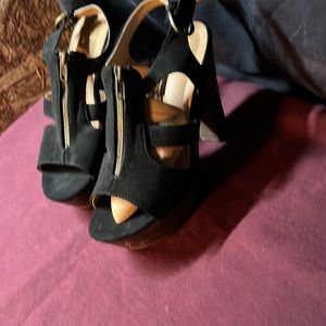 Black  suede high heals. Wooden heal